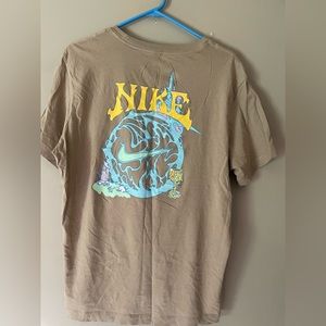 Nike short sleeved tee shirt , beige with blue green and pink design, size large